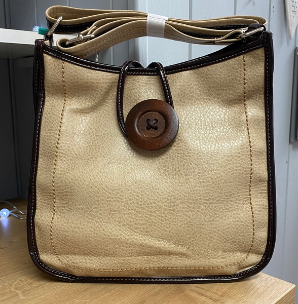 Handbag with looped Button Fastener