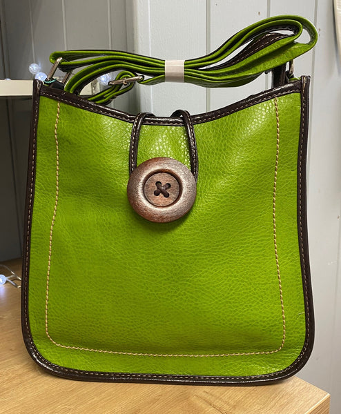 Handbag with looped Button Fastener